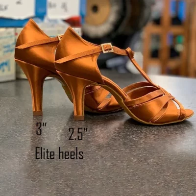 Mia T-bar latin ballroom dance shoes in Tan Satin, showing the difference between the two elite heel heights.